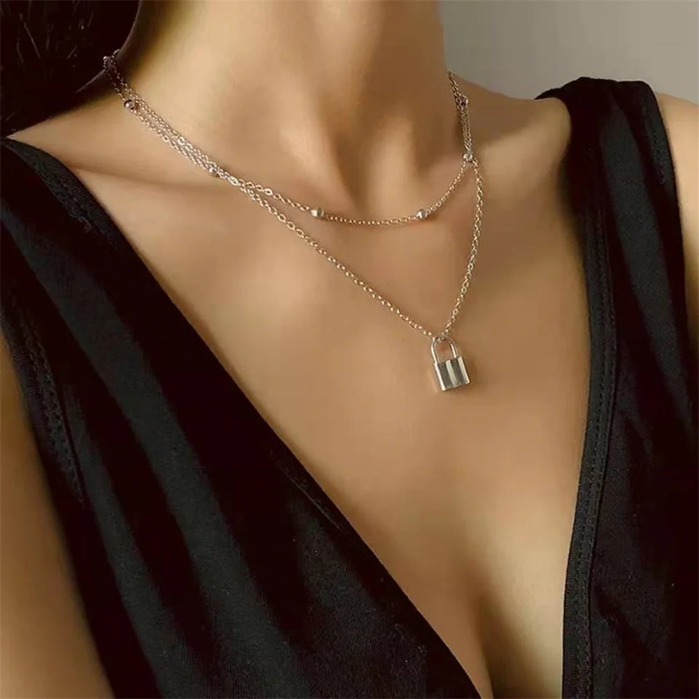 Round brand pendant multi-layer Necklace women's European and American trend metal small lock head clavicle chain jewelry
Round brand pendant multi-layer Necklace women's European and American trend metal small lock head clavicle chain jewelry