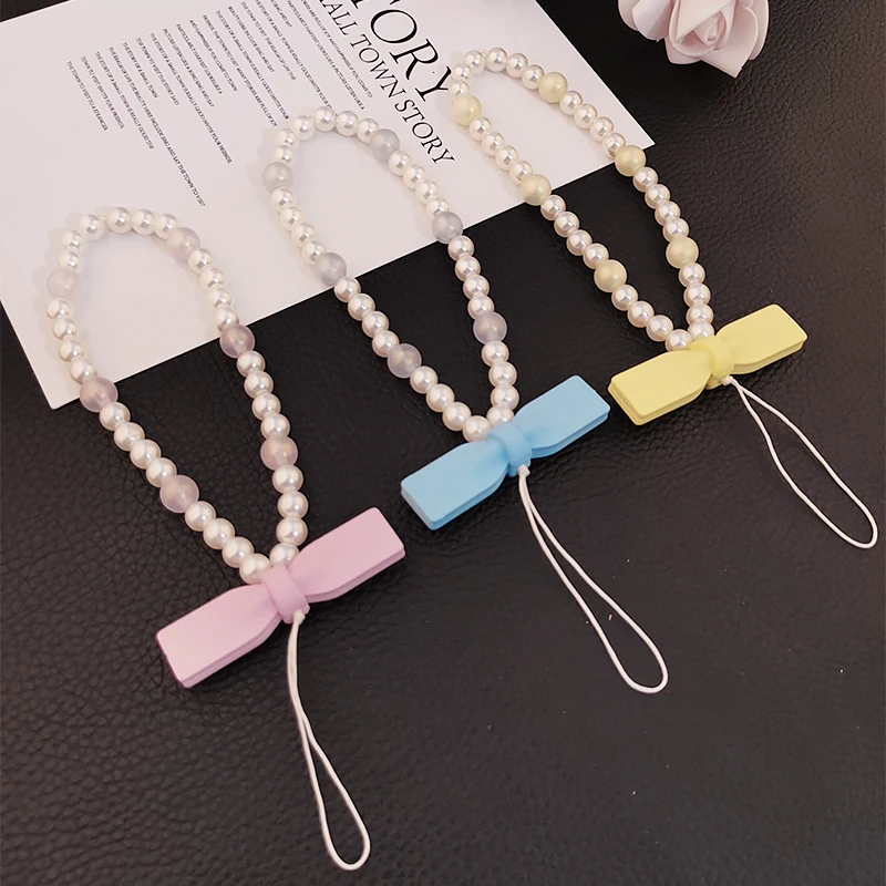 Mobile Phone Lanyard Exquisite Pendant Keychain Anti-lost Sling Light Luxury Chain Short Wrist Bow Tie Pearl Women's Pendant
Mobile Phone Lanyard Exquisite Pendant Keychain Anti-lost Sling Light Luxury Chain Short Wrist Bow Tie Pearl Women's Pendant