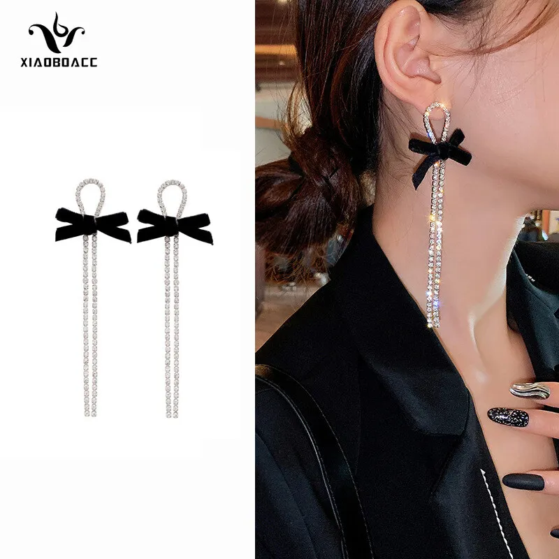 XiaoboACC S925 Silver Needle Flashing Diamond Earrings for WOmen Black Bowknot Long Tassel Dangle Earrings
XiaoboACC S925 Silver Needle Flashing Diamond Earrings for WOmen Black Bowknot Long Tassel Dangle Earrings