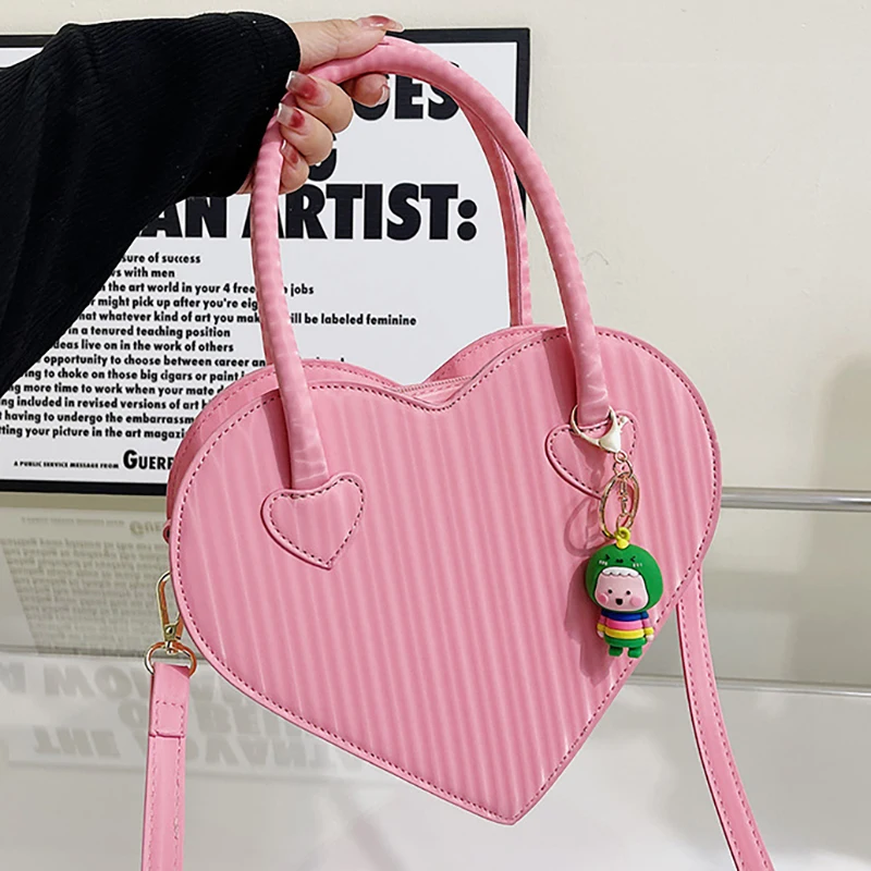 HAEX Fashion Heart Shoulder Bag Female Candy Color Women's Bag 2022 Trend Crossbody Ladies Handbag Harajuku Y2k Bolso Mujer
HAEX Fashion Heart Shoulder Bag Female Candy Color Women's Bag 2022 Trend Crossbody Ladies Handbag Harajuku Y2k Bolso Mujer