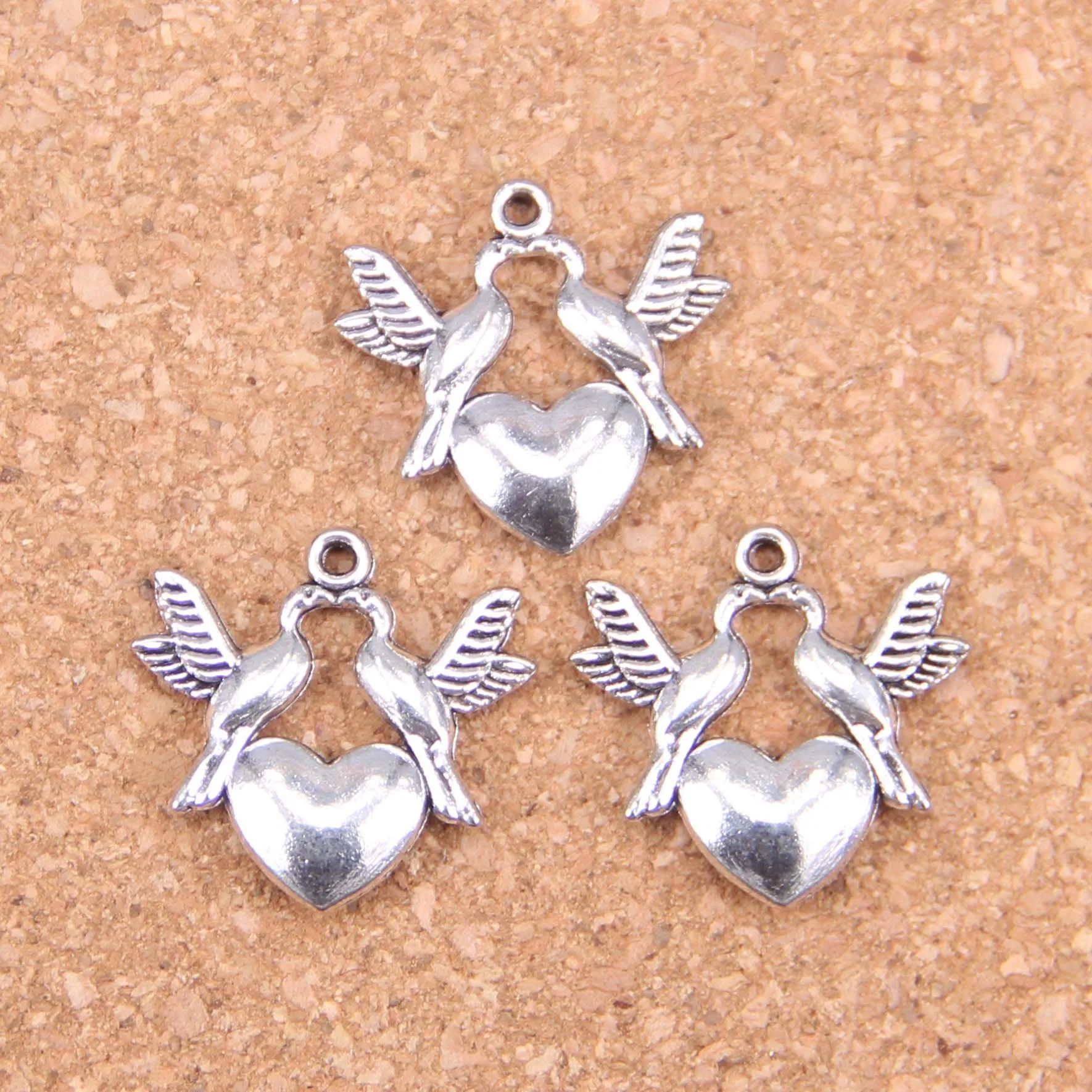 76pcs Charms kissing doves birds heart 21x21mm Antique Pendants,Vintage Tibetan Silver Jewelry,DIY for bracelet necklace
76pcs Charms kissing doves birds heart 21x21mm Antique Pendants,Vintage Tibetan Silver Jewelry,DIY for bracelet necklace