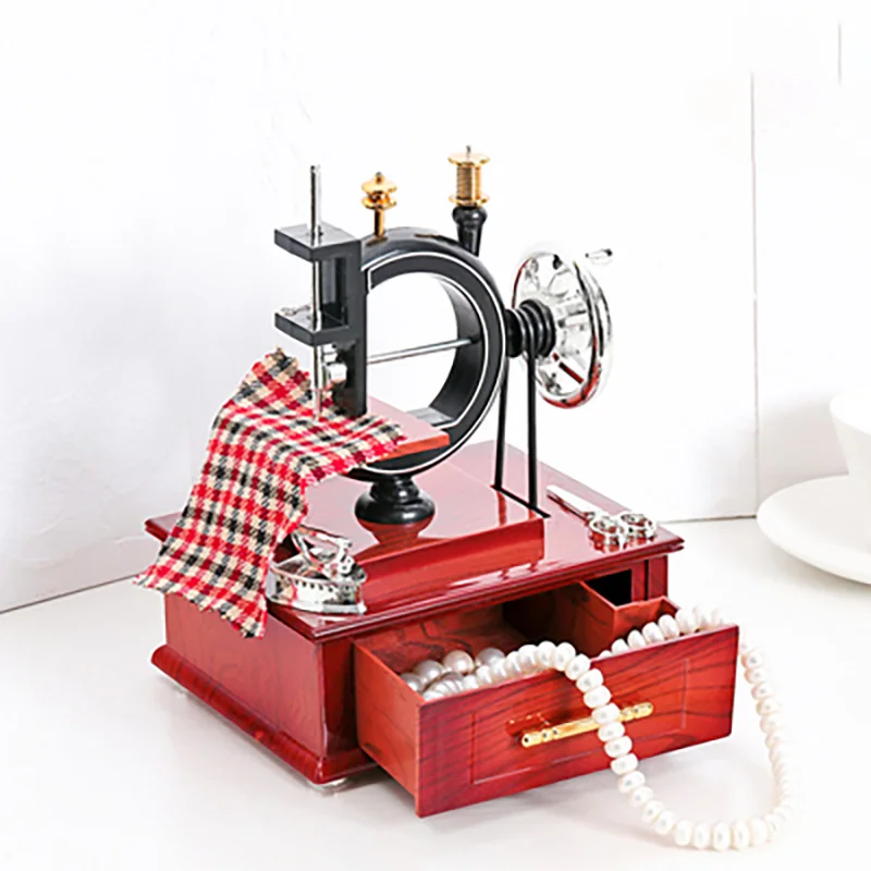 Retro Old Hand Sewing Machine Music Box Personality Creative Clothing Store Home Decorativas Ornaments
Retro Old Hand Sewing Machine Music Box Personality Creative Clothing Store Home Decorativas Ornaments