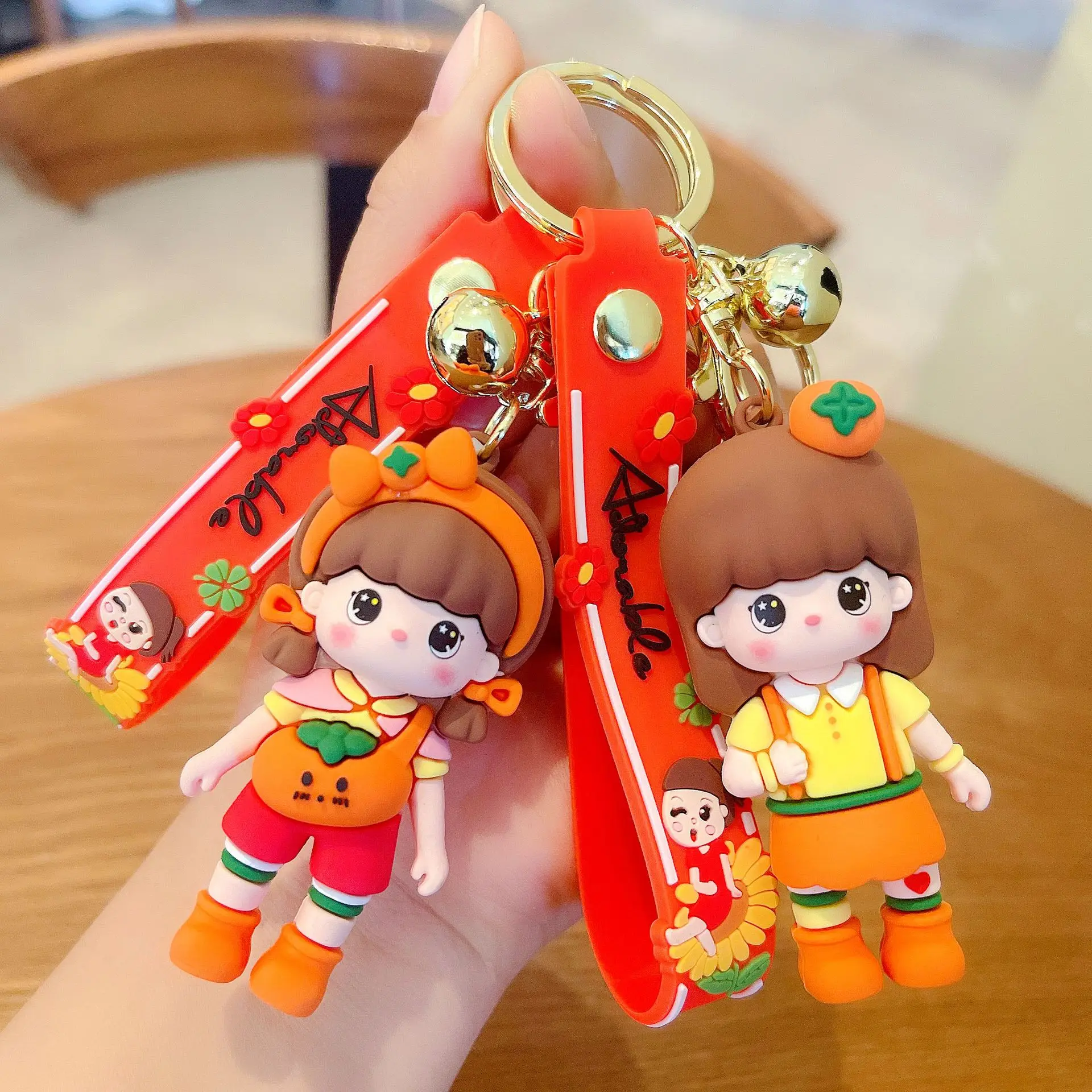 Orange Strap Girl Keychain Cute Soft Plastic Design Exquisite Backpack Pendant Three-dimensional Cartoon Car Key Chain Wholesale
Orange Strap Girl Keychain Cute Soft Plastic Design Exquisite Backpack Pendant Three-dimensional Cartoon Car Key Chain Wholesale