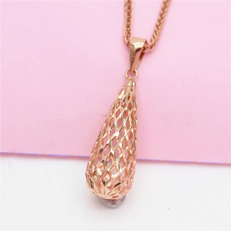 New 585 purple gold necklace for women simple classic hollow water drop pendant plated 14K rose gold wedding party jewelry
New 585 purple gold necklace for women simple classic hollow water drop pendant plated 14K rose gold wedding party jewelry