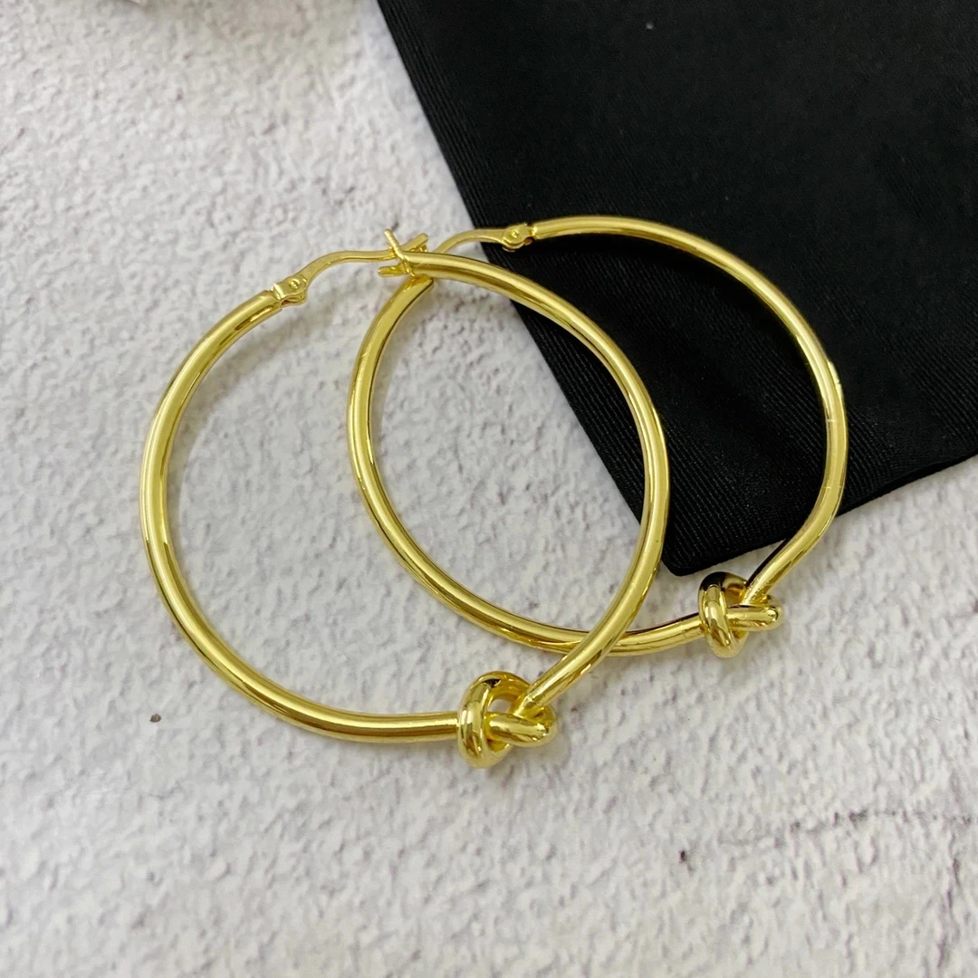Gold Knot Hoop Earrings European And American Niche Design Fashion Top Quality Jewelry For Woman Trend
Gold Knot Hoop Earrings European And American Niche Design Fashion Top Quality Jewelry For Woman Trend