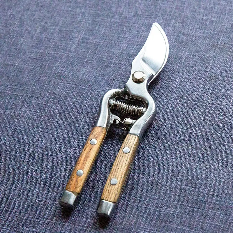Stainless Steel Wooden Handle Thick Pruning Pruning Gardening Scissors Household Floral Scissors
Stainless Steel Wooden Handle Thick Pruning Pruning Gardening Scissors Household Floral Scissors