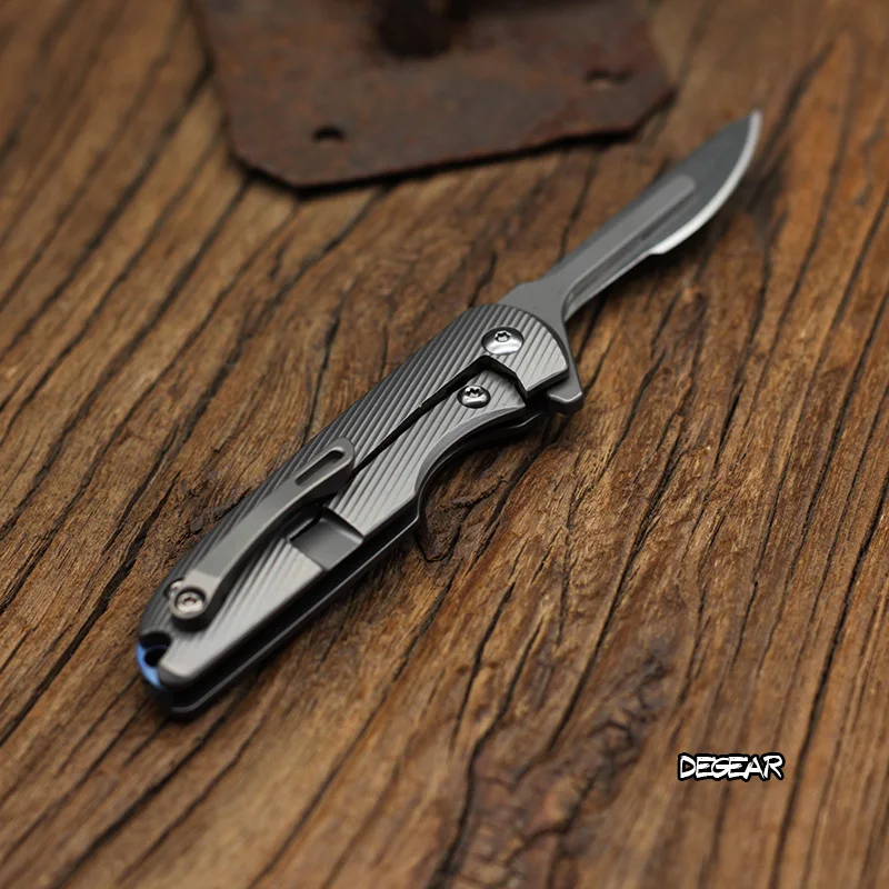 Mini Titanium Alloy Utility Folding Knife EDC Emergency Key Chain Medical Knife Open Box Pocket Knife With Extra Blades
Mini Titanium Alloy Utility Folding Knife EDC Emergency Key Chain Medical Knife Open Box Pocket Knife With Extra Blades