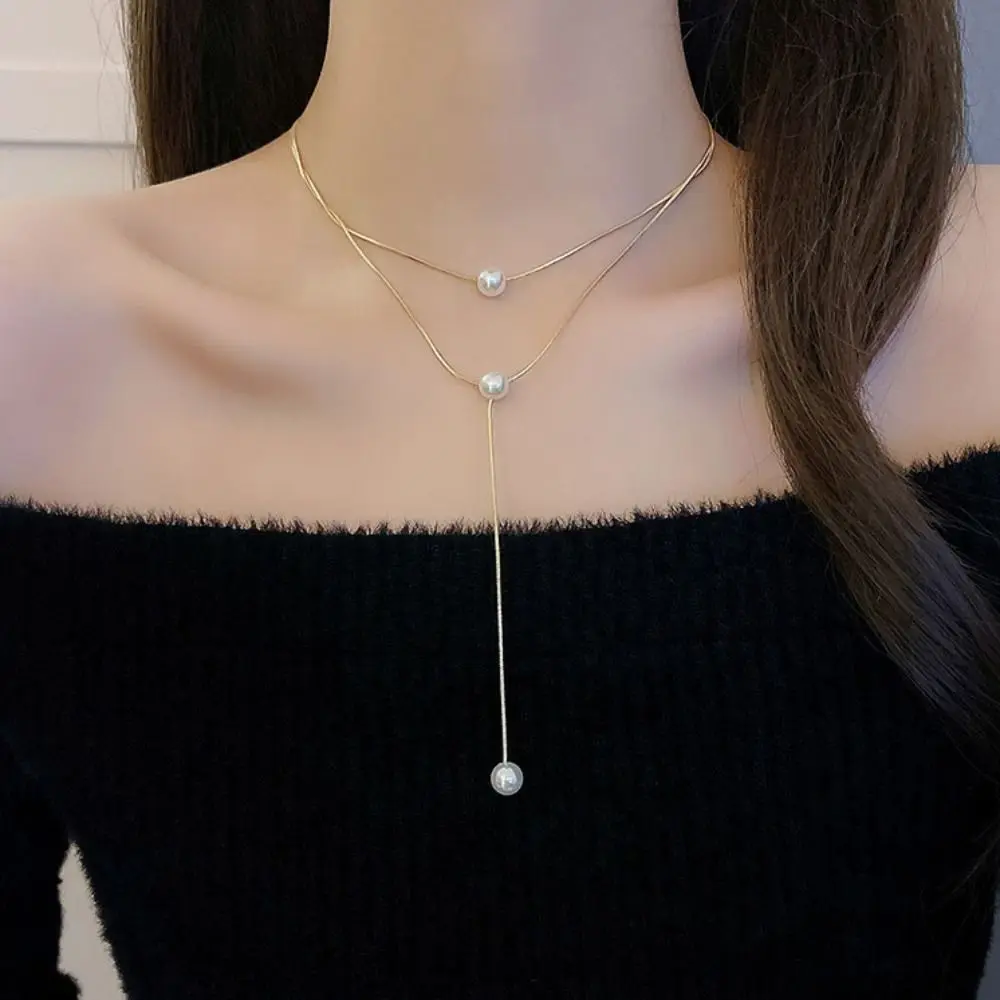 Simple Charming Tassel Long Chain Pearl Necklace Pendant For Women Wedding Jewelry Accessories Choker Necklace
Simple Charming Tassel Long Chain Pearl Necklace Pendant For Women Wedding Jewelry Accessories Choker Necklace