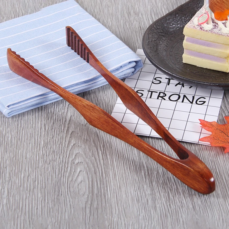 1 Pc Wooden Clip Cooking Kitchen Food Barbecue Tool Salad Bacon Steak Bread Tongs Cake Household Kitchen Utensils
1 Pc Wooden Clip Cooking Kitchen Food Barbecue Tool Salad Bacon Steak Bread Tongs Cake Household Kitchen Utensils