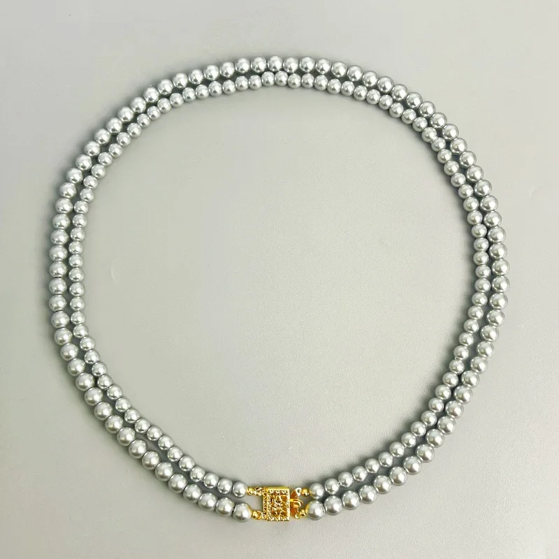 European and American Fashion Double Row Pearl Necklace, High-end Feeling, Light Luxury, Gray Pearl Collarbone Chain, Female
European and American Fashion Double Row Pearl Necklace, High-end Feeling, Light Luxury, Gray Pearl Collarbone Chain, Female