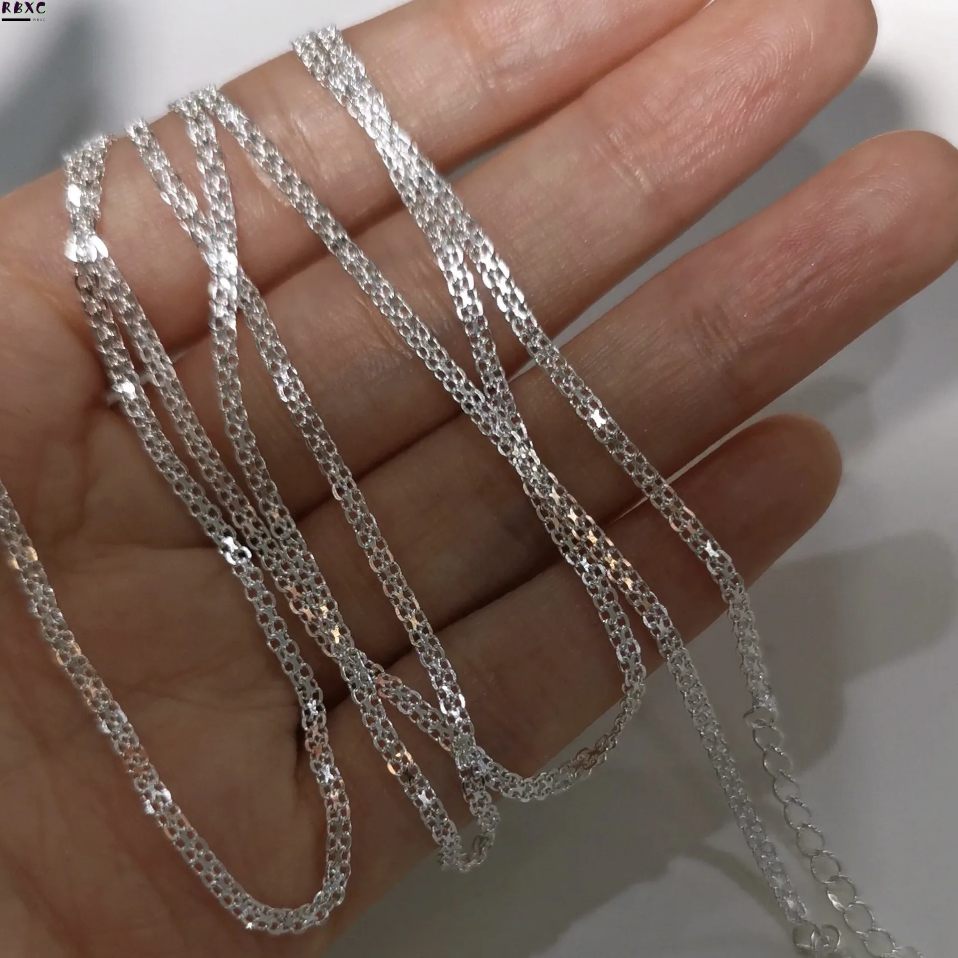 RXBC 925 pure silver braided white silver shimmering fine version Korean East Gate necklace, fashionable, luxurious and cool
RXBC 925 pure silver braided white silver shimmering fine version Korean East Gate necklace, fashionable, luxurious and cool