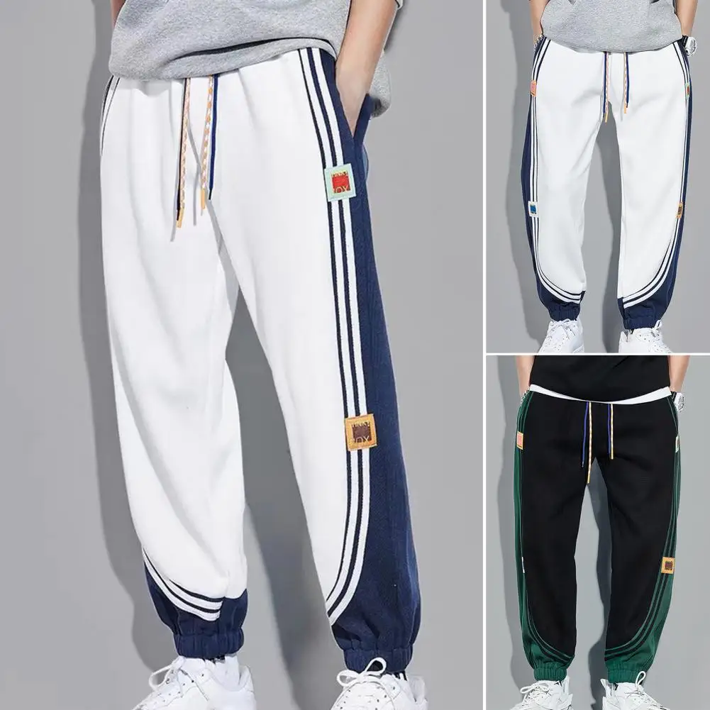 Trendy Men Sweatpants Mid Waists Male Contrast Color Pockets Trousers Temperament Sports Pants Streetwear 
Trendy Men Sweatpants Mid Waists Male Contrast Color Pockets Trousers Temperament Sports Pants Streetwear