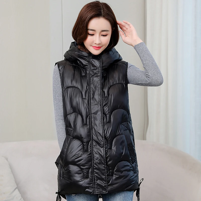 Autumn Winter Black Vest Women Sleeveless Waistcoat Hooded Loose Winter Outerwear Fashion Cotton Sleeveless Jacket Woman Vest
Autumn Winter Black Vest Women Sleeveless Waistcoat Hooded Loose Winter Outerwear Fashion Cotton Sleeveless Jacket Woman Vest