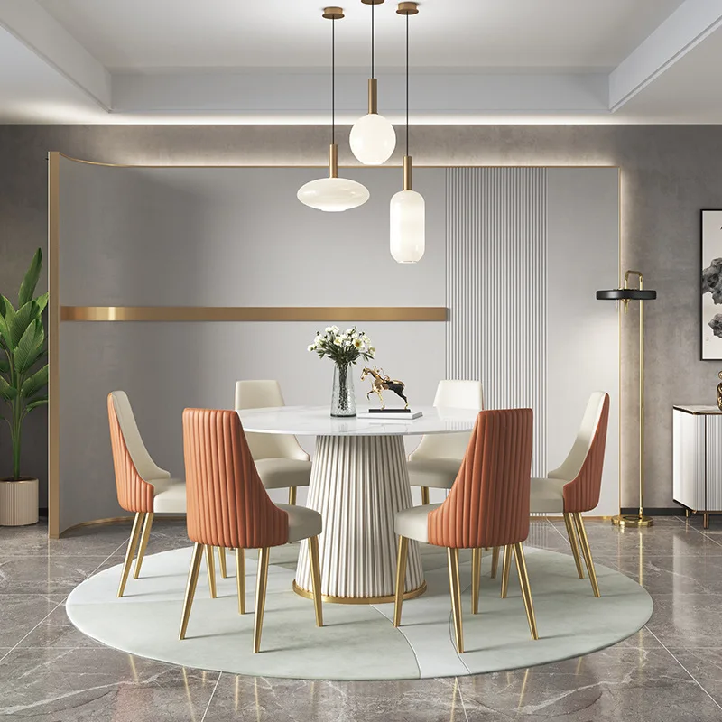 Designer high-end light luxury rock plate round dining table modern simple household small family dining table chair combination
Designer high-end light luxury rock plate round dining table modern simple household small family dining table chair combination