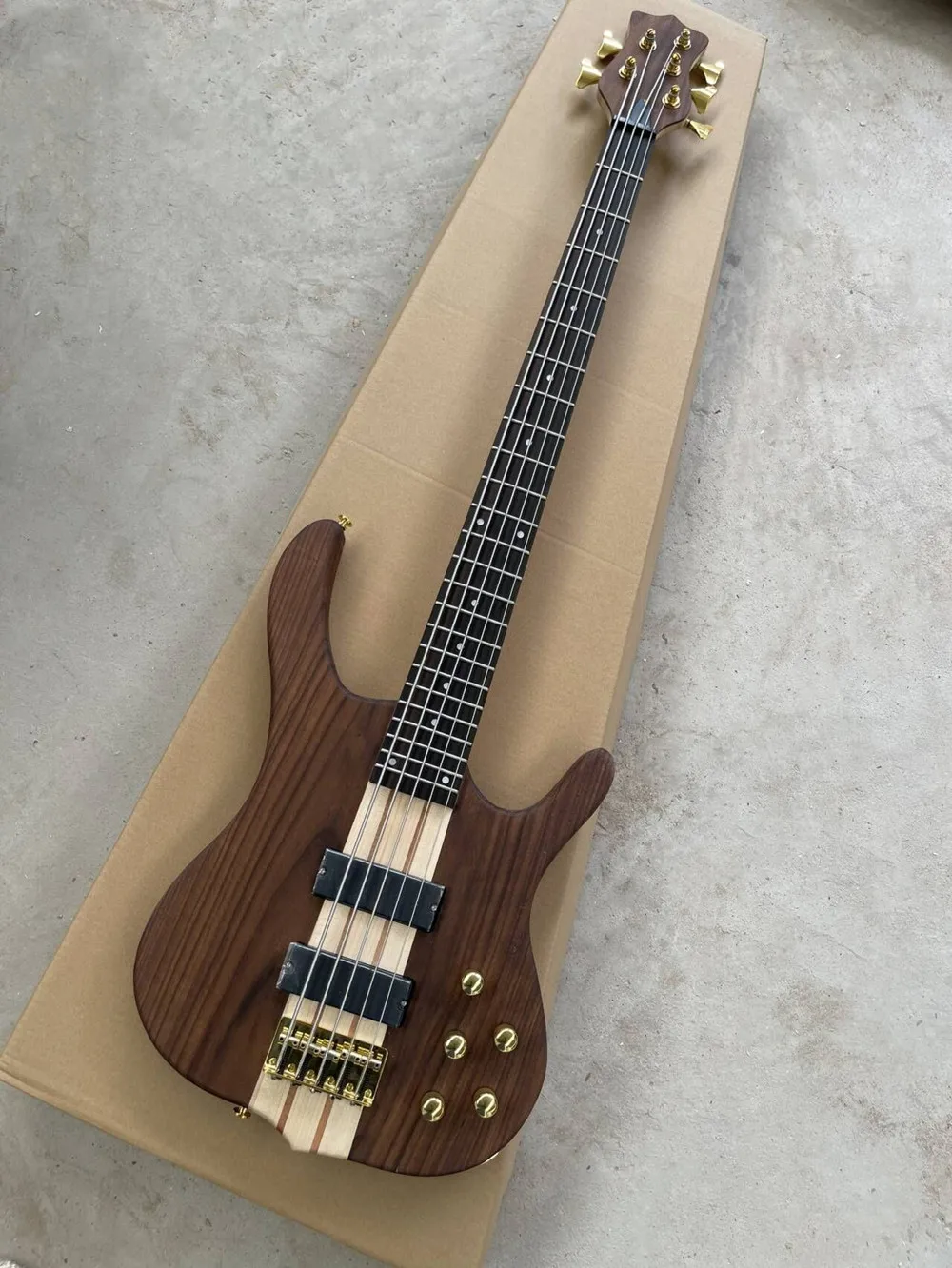 Walnut Body 5 Strings Electric Bass Guitar Neck Through body,Gold Hardware,Provide Customized Services
Walnut Body 5 Strings Electric Bass Guitar Neck Through body,Gold Hardware,Provide Customized Services