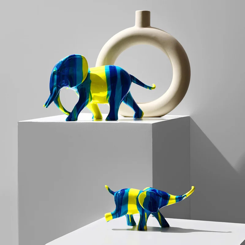Nordic art camouflage elephant ornaments A pair of resin creative luxury living room TV cabinet porch home decorations
Nordic art camouflage elephant ornaments A pair of resin creative luxury living room TV cabinet porch home decorations