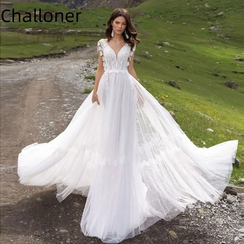 Challoner Beach Sleeveless Tulle Wedding Dress For Women V-neck With Lace Appliques Feathers Tassel Vestido De Novia Bride Gowns
Challoner Beach Sleeveless Tulle Wedding Dress For Women V-neck With Lace Appliques Feathers Tassel Vestido De Novia Bride Gowns
