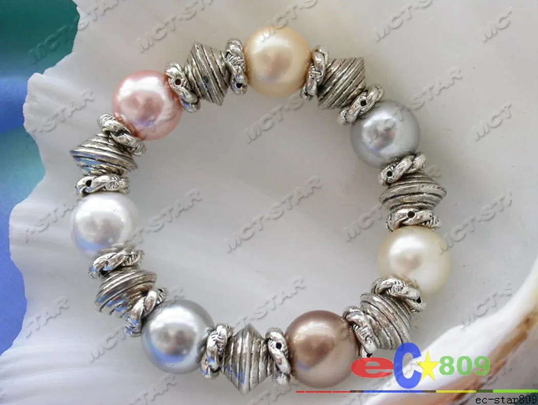 P2467 стрейч 8 дюймов 14 мм розовый серый жемчужный браслет с морской раковиной
P2467 стрейч 8 дюймов 14 мм розовый серый жемчужный браслет с морской раковиной