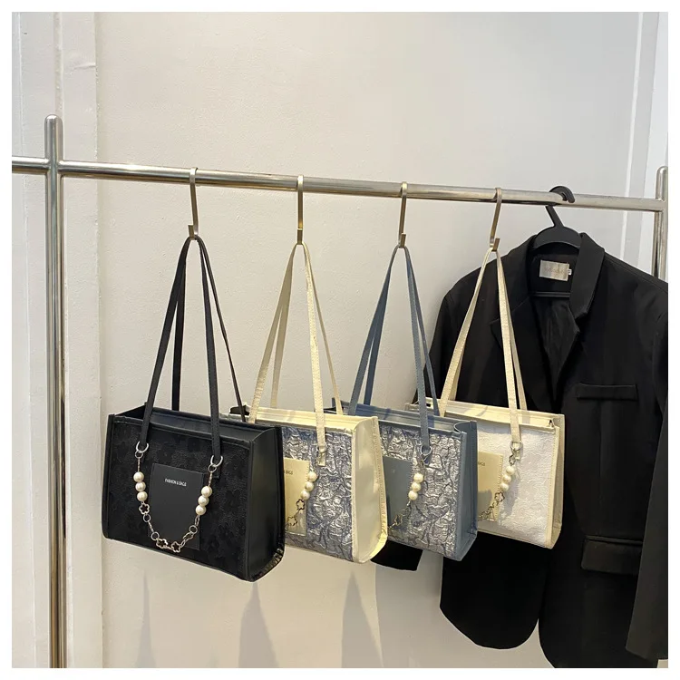 Large Capacity Solid Color Pearl Print Fashion Bag Chain Shoulder Bag Niche Design Underarm Bag
Large Capacity Solid Color Pearl Print Fashion Bag Chain Shoulder Bag Niche Design Underarm Bag
