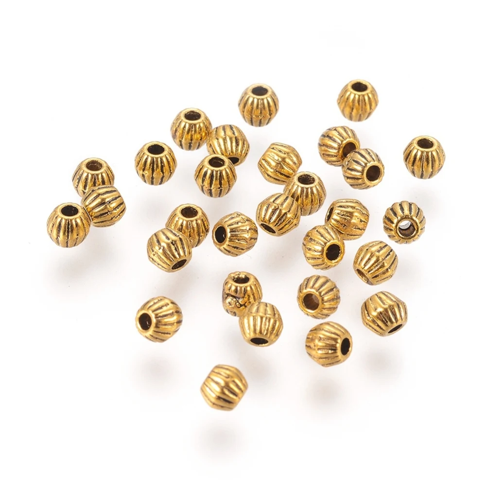 200PCS Tibetan Style Alloy Spacer Beads Lead Cadmium Free Bicone Antique Golden Color Size: about 4mm long 4.5mm wide hole: 1mm.
200PCS Tibetan Style Alloy Spacer Beads Lead Cadmium Free Bicone Antique Golden Color Size: about 4mm long 4.5mm wide hole: 1mm.