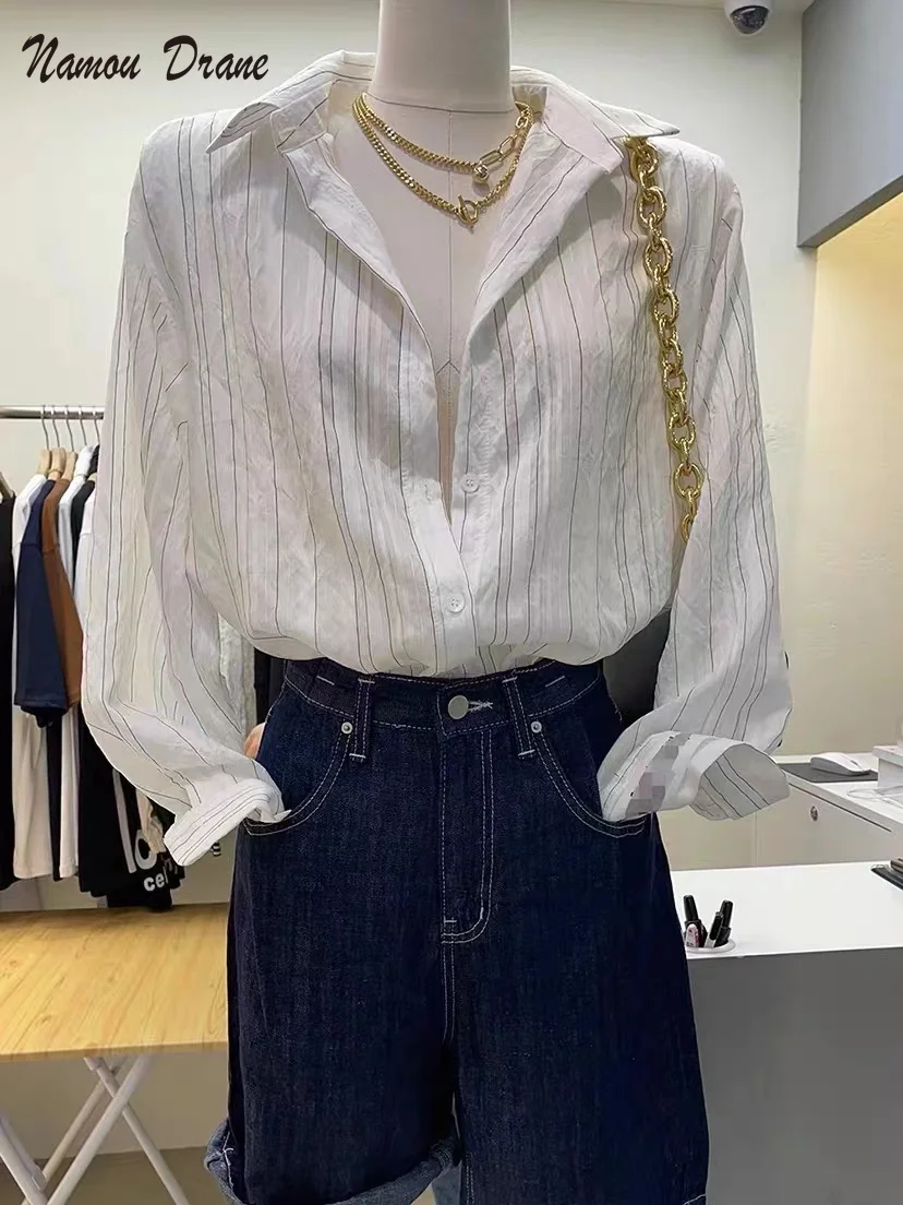 Namou Drane 2022 Spring/summer Fashion Thin Stripe Slightly Permeable Fashion Temperament Long Sleeve Sun Protection Shirt Tide
Namou Drane 2022 Spring/summer Fashion Thin Stripe Slightly Permeable Fashion Temperament Long Sleeve Sun Protection Shirt Tide