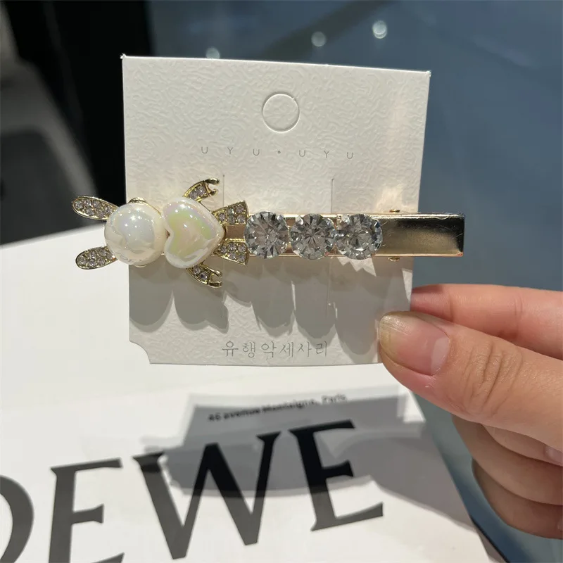 Pearl band diamond hairpin summer feminine cartoon clip bow duck hairpin hair accessories
Pearl band diamond hairpin summer feminine cartoon clip bow duck hairpin hair accessories