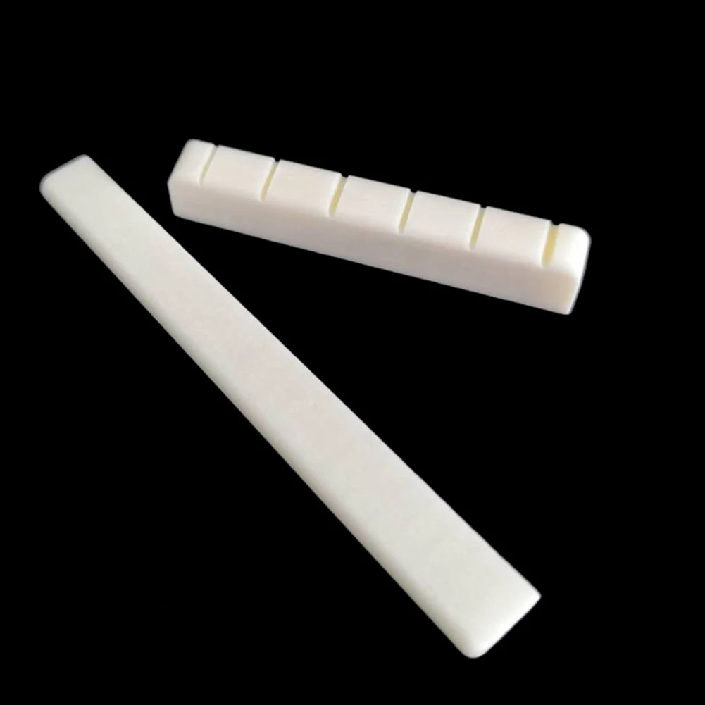 High Quality Guitar Nut Real Bone 52mm 6 String 80mm Bone Bridge Classical Guitar Guitar Saddle Nut Replacement
High Quality Guitar Nut Real Bone 52mm 6 String 80mm Bone Bridge Classical Guitar Guitar Saddle Nut Replacement