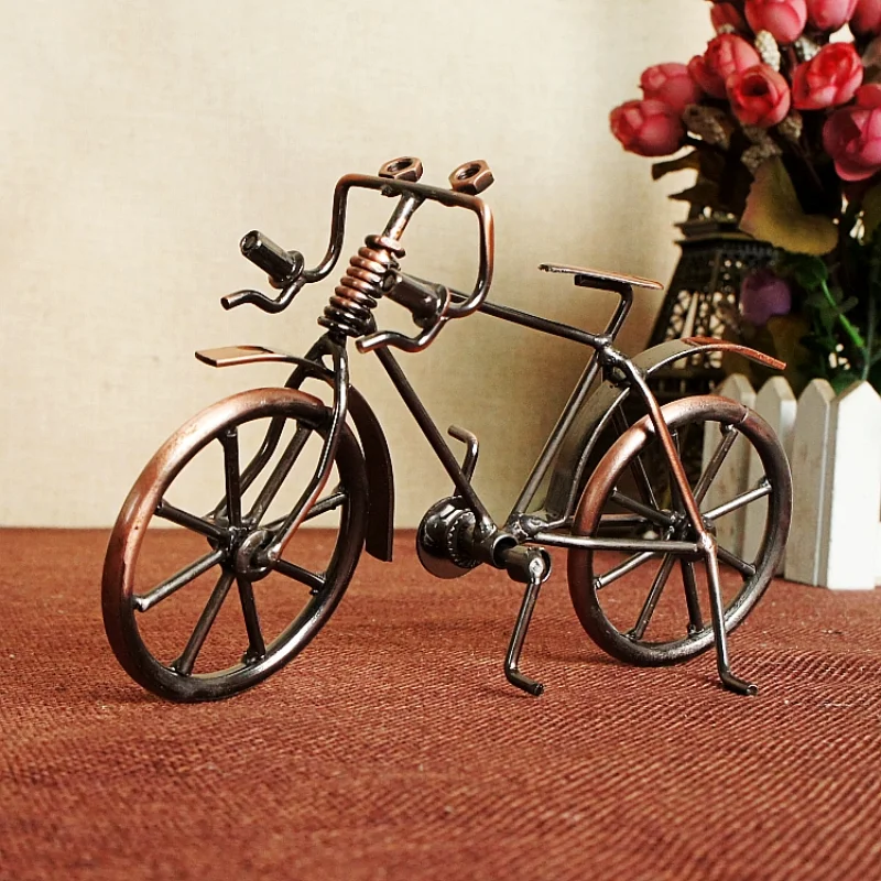 Vintage old pedal bike model, ornaments, metal crafts 
Vintage old pedal bike model, ornaments, metal crafts
