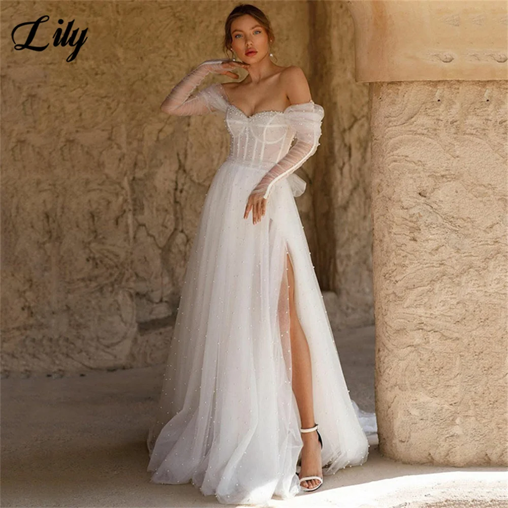Ivory Pearls Wedding Dress A Line Long Sleeve Beach Sweetheart Neck Bride Dresses Vestido De Novia Side Split Wedding Gown
Ivory Pearls Wedding Dress A Line Long Sleeve Beach Sweetheart Neck Bride Dresses Vestido De Novia Side Split Wedding Gown
