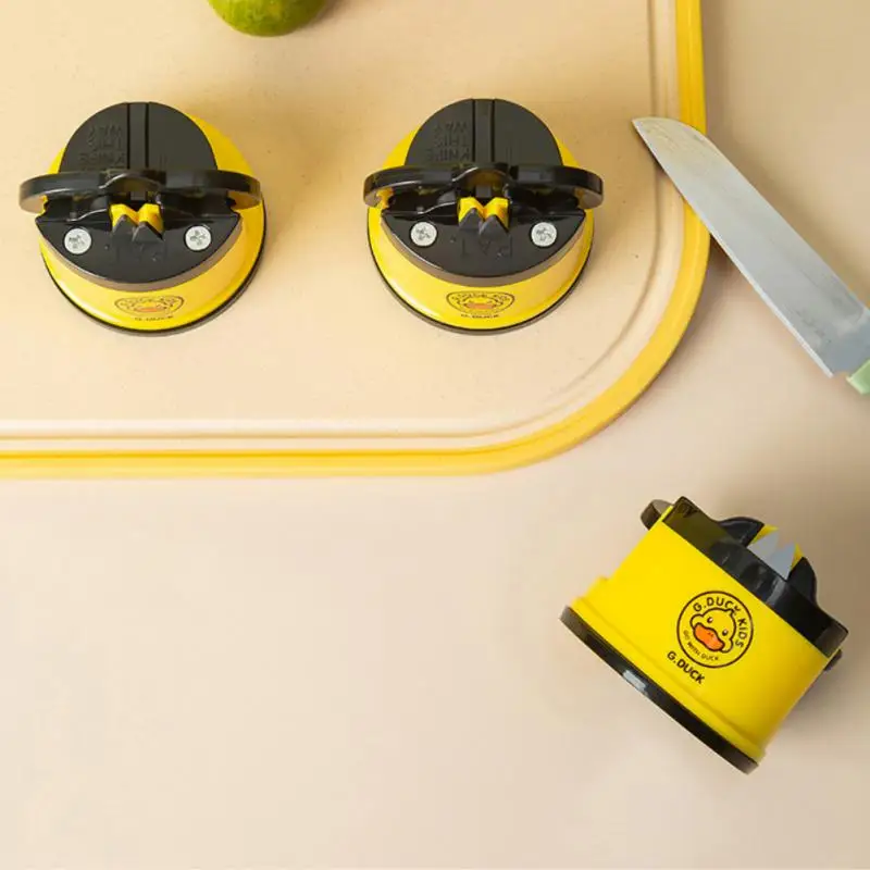 Knife Sharpener Household Quick Sharpener Multi-functional Double-sided Kitchen Small Yellow Duck Suction Cup Sharpening Stone
Knife Sharpener Household Quick Sharpener Multi-functional Double-sided Kitchen Small Yellow Duck Suction Cup Sharpening Stone