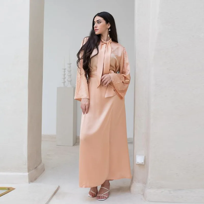 Ramadan Eid Muslim Fashion Middle East Dubai Women Satin Bubble Beads Long Sleeve Bow Tie Dress Dubai Abaya Turkish Dresses 2022
Ramadan Eid Muslim Fashion Middle East Dubai Women Satin Bubble Beads Long Sleeve Bow Tie Dress Dubai Abaya Turkish Dresses 2022