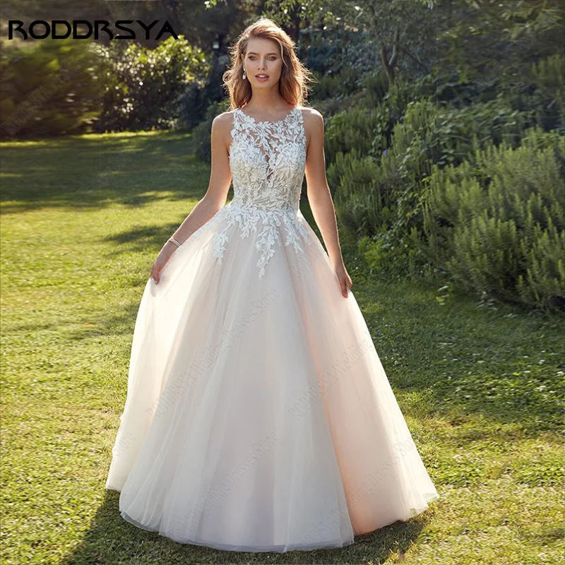 RODDRSYA Lace Sleeveless O-Neck Wedding Dress Beach Applique Bridal Gown Illusion Buttons Back robe de mariée fluide Sweep Trian
RODDRSYA Lace Sleeveless O-Neck Wedding Dress Beach Applique Bridal Gown Illusion Buttons Back robe de mariée fluide Sweep Trian