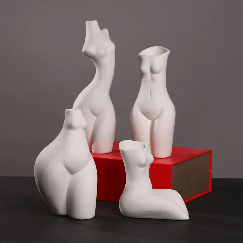 Nordic creative body art ceramic vase ornaments home living room coffee table flower arrangement desktop decoration ornaments
Nordic creative body art ceramic vase ornaments home living room coffee table flower arrangement desktop decoration ornaments