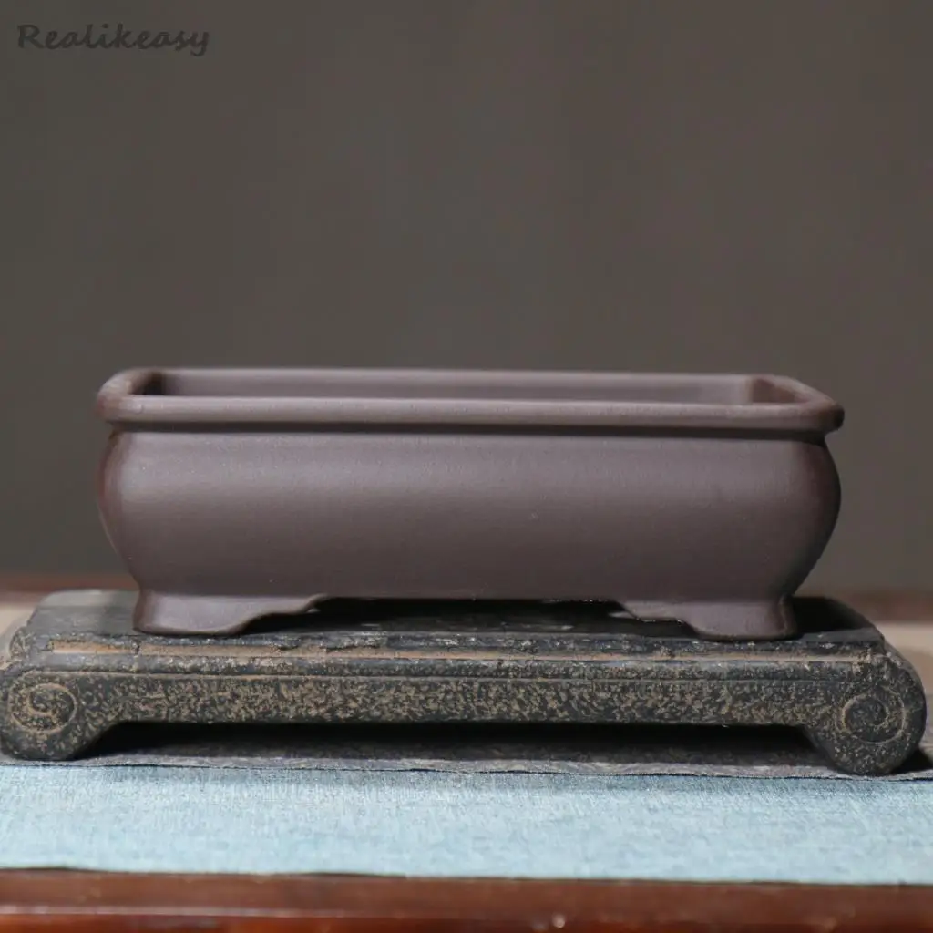 Квадратный керамический горшок Realikeasy из фиолетовой глины
Квадратный керамический горшок Realikeasy из фиолетовой глины