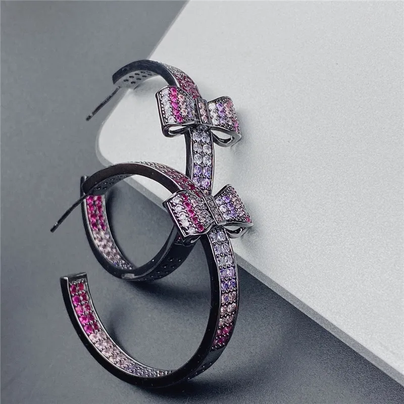Micro Pave Cubic Zirconia Bowknot Circle Stud Earrings for Women 2023 Fashionable Statement Brand Luxury Jewelry
Micro Pave Cubic Zirconia Bowknot Circle Stud Earrings for Women 2023 Fashionable Statement Brand Luxury Jewelry