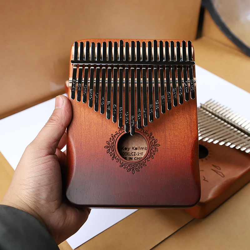 Kalimba 21 key Piano High-quality Mahogany Protable Musical Instrument Beginner Thumb Calimba Piano With Accessory
Kalimba 21 key Piano High-quality Mahogany Protable Musical Instrument Beginner Thumb Calimba Piano With Accessory