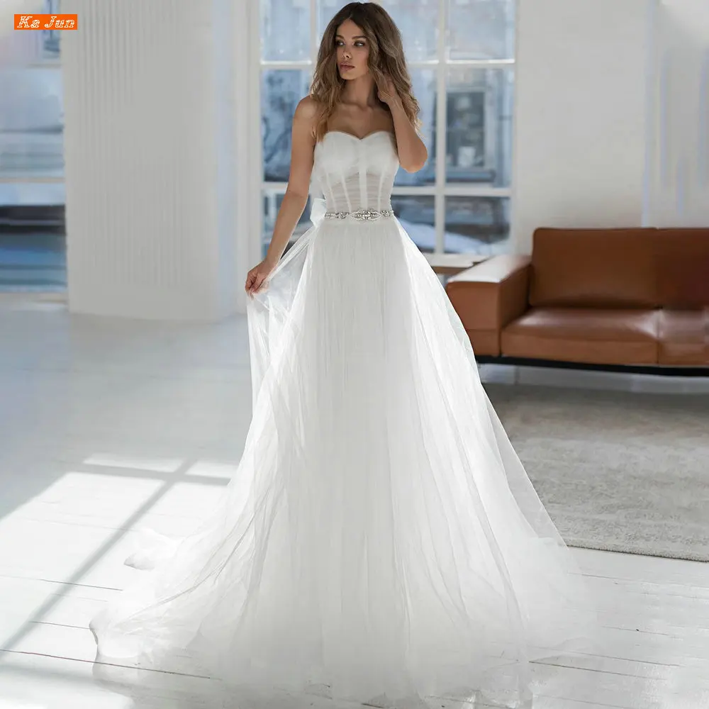 Boho Strapless Sleeveless Wedding Dress Beaded Belt Vestidos De Noiva Simple A Line Buttons Backless Bridal Gown Robe De Mariée
Boho Strapless Sleeveless Wedding Dress Beaded Belt Vestidos De Noiva Simple A Line Buttons Backless Bridal Gown Robe De Mariée