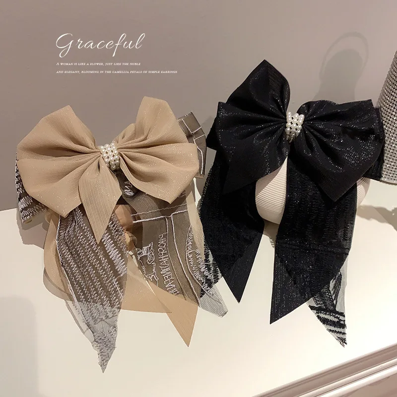 Korean Fashion Simple Personality Hair Clip Pearl Gauze Bowknot Spring Mesh Red Temperament Design Jewelry
Korean Fashion Simple Personality Hair Clip Pearl Gauze Bowknot Spring Mesh Red Temperament Design Jewelry
