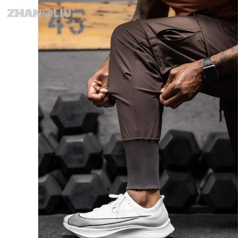 Новинка 2023, камуфляжные спортивные штаны для мужчин, брюки для фитнеса, летние тонкие свободные быстросохнущие эластичные спортивные штаны... 
Новинка 2023, камуфляжные спортивные штаны для мужчин, брюки для фитнеса, летние тонкие свободные быстросохнущие эластичные спортивные штаны...