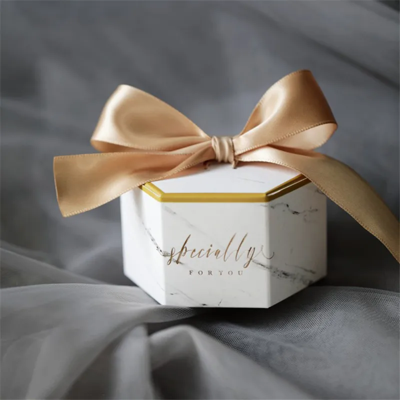 20/30/50pcs Hexagon Geometric Candy Box Wedding Souvenirs Favors Communion Marbling Printed Cardboard Dragees Boxes Goodie Bags
20/30/50pcs Hexagon Geometric Candy Box Wedding Souvenirs Favors Communion Marbling Printed Cardboard Dragees Boxes Goodie Bags