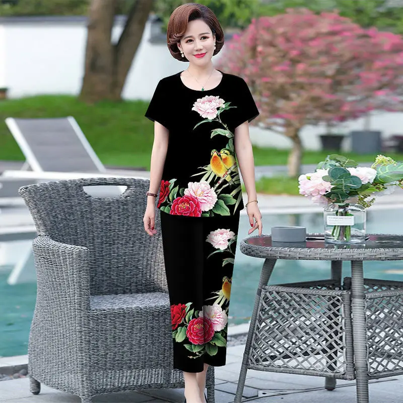 Women 2022 Summer New Two Piece Sets Female O-neck Printed Tops + Straight Pants Ladies Loose Middle-Aged Mothers Suit A311
Women 2022 Summer New Two Piece Sets Female O-neck Printed Tops + Straight Pants Ladies Loose Middle-Aged Mothers Suit A311
