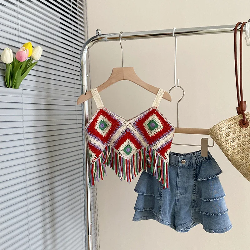 Girls Set Hollow Knit Short Fringe Halter Vest + Thin Cake Trouser Skirt Two-piece Set Ethnic Style Suit Girls Clothes
Girls Set Hollow Knit Short Fringe Halter Vest + Thin Cake Trouser Skirt Two-piece Set Ethnic Style Suit Girls Clothes