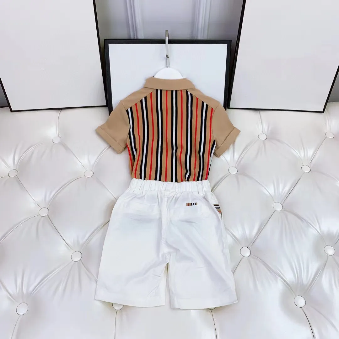 2022 summer new boys' suit Khaki Lapel stripe Top + white shorts casual high quality brand children's wear
2022 summer new boys' suit Khaki Lapel stripe Top + white shorts casual high quality brand children's wear