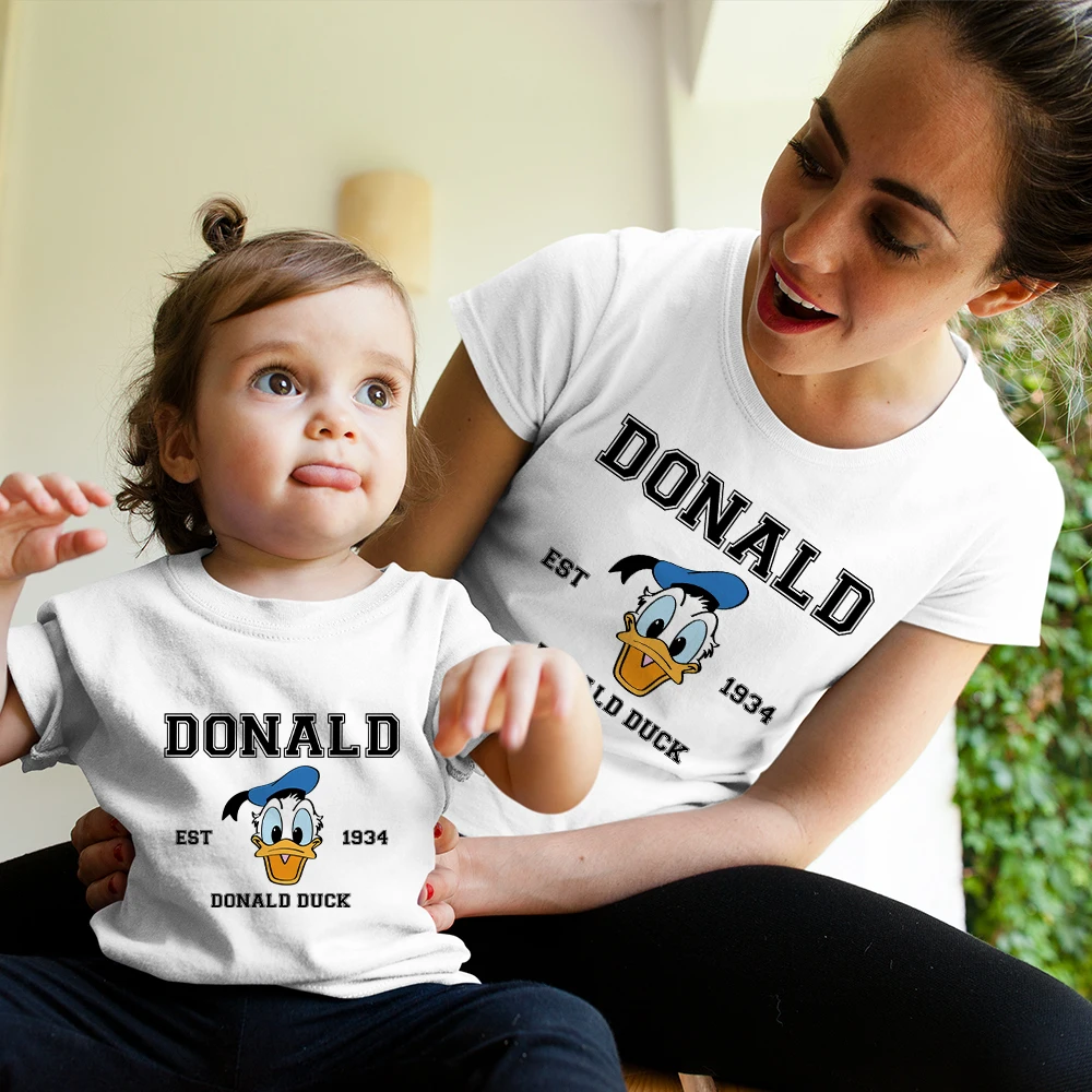 Mother Kids Disney Clothes Est 1934 Donald Duck Print Fashion Toddler Girl T Shirt 2022 Summer Mom Daughter Family Look Outfits
Mother Kids Disney Clothes Est 1934 Donald Duck Print Fashion Toddler Girl T Shirt 2022 Summer Mom Daughter Family Look Outfits