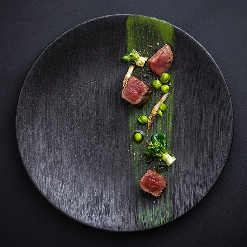 1 Piece Steak Creative Dinner Flat Black Plate Ceramic Platter Western Simple Food Dishes Heat Resistant Home Nordic Tableware
1 Piece Steak Creative Dinner Flat Black Plate Ceramic Platter Western Simple Food Dishes Heat Resistant Home Nordic Tableware