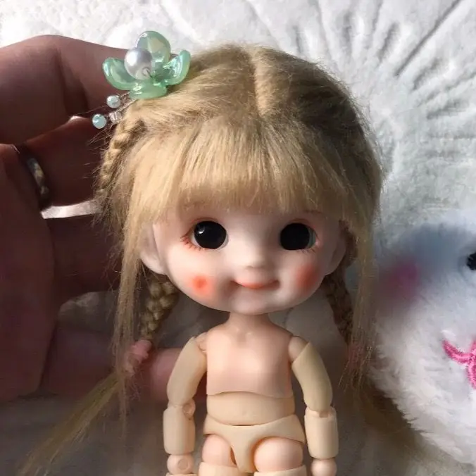 Голова куклы Ob11 1/12 Bjd, голова куклы с париком, милая кукла со смайликом, девочка, игрушки «сделай сам», только голова без тела
Голова куклы Ob11 1/12 Bjd, голова куклы с париком, милая кукла со смайликом, девочка, игрушки «сделай сам», только голова без тела