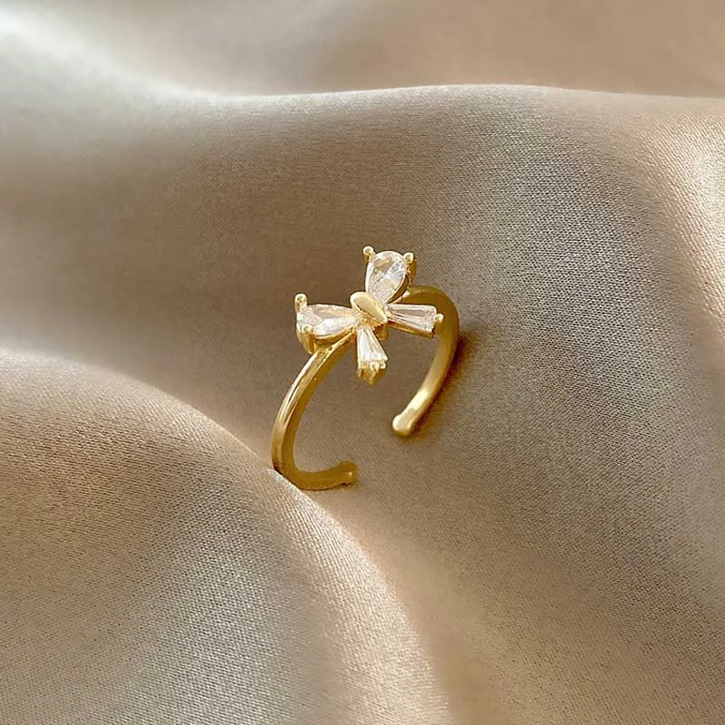 New simple and fashionable bowknot inlaid with Hao stone open ring, female temperament, versatile ring, trendy party jewelry
New simple and fashionable bowknot inlaid with Hao stone open ring, female temperament, versatile ring, trendy party jewelry