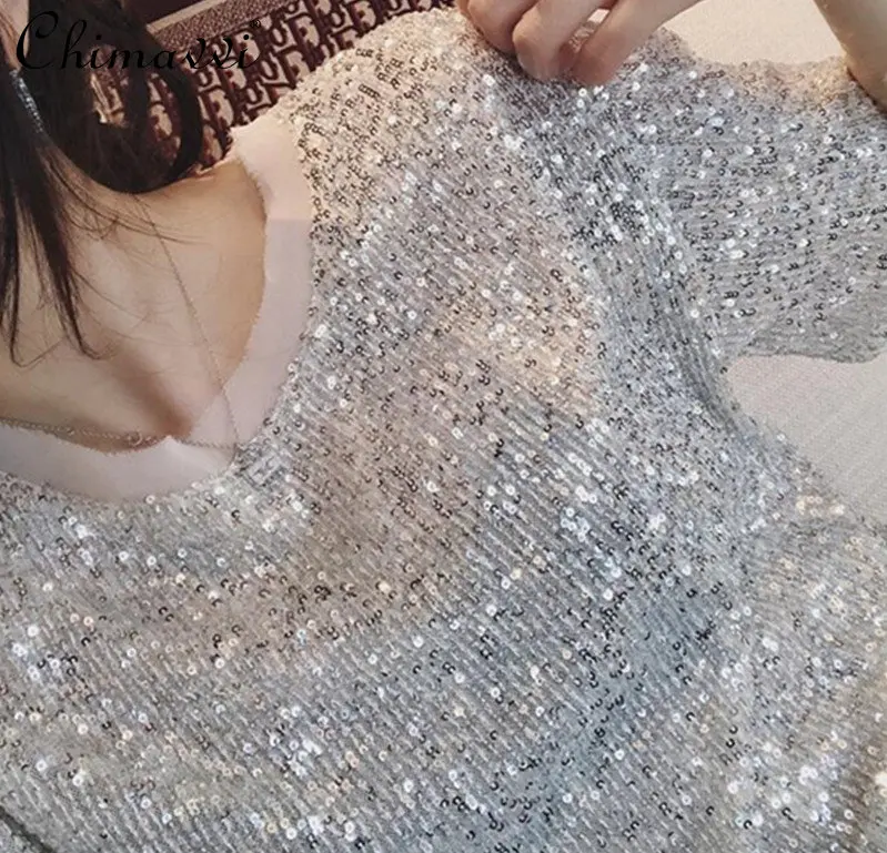 2023 Spring and Summer New Style Silver Mermaid Sequined T-shirt Women's Stylish Loose Short Sleeve Shiny Pullover Tee Top
2023 Spring and Summer New Style Silver Mermaid Sequined T-shirt Women's Stylish Loose Short Sleeve Shiny Pullover Tee Top