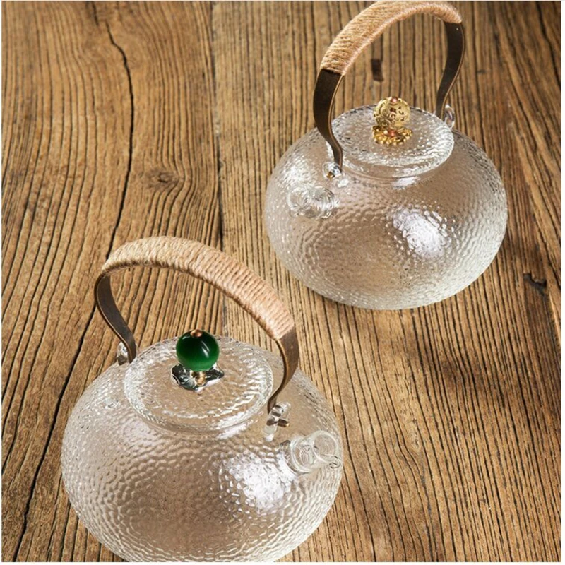 Glass Teapot Handmade Iron Pot Handle Copper Pot Button Uniform Thickness Transparent Heat-resistant Household Items Tea Maker
Glass Teapot Handmade Iron Pot Handle Copper Pot Button Uniform Thickness Transparent Heat-resistant Household Items Tea Maker