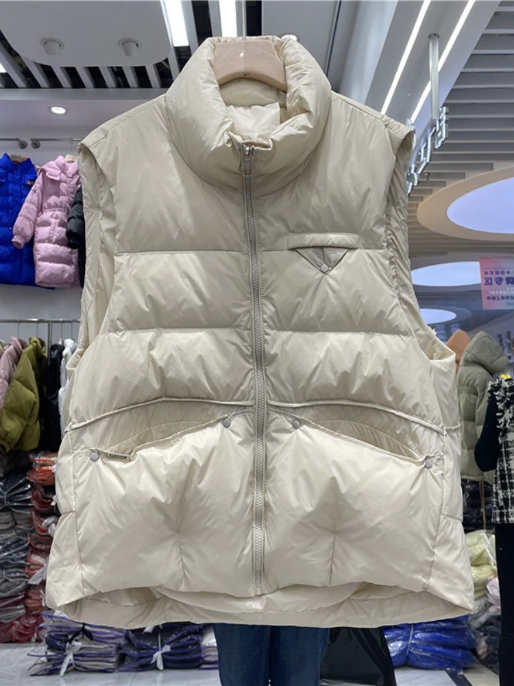 FTLZZ New Autumn Winter Stand Collar Down Vest Women Casual Zipper Sleeveless 90% White Duck Down Coat Loose Fashion Outwear
FTLZZ New Autumn Winter Stand Collar Down Vest Women Casual Zipper Sleeveless 90% White Duck Down Coat Loose Fashion Outwear